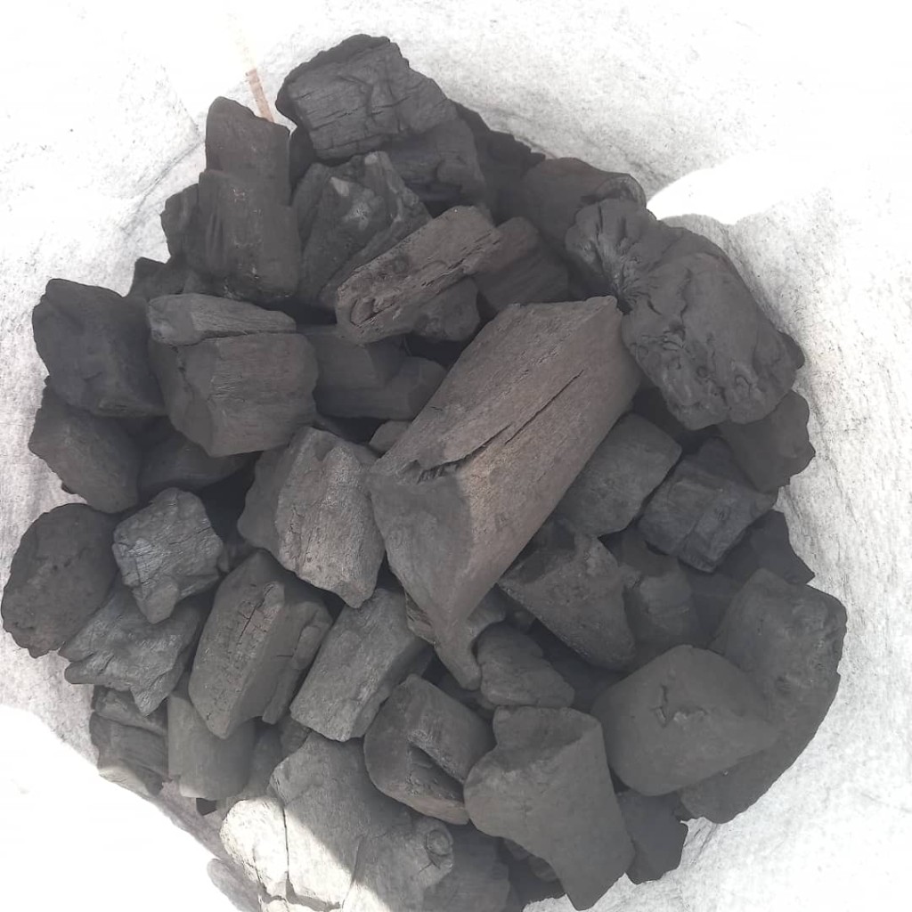 Hardwood charcoal pieces in a sack