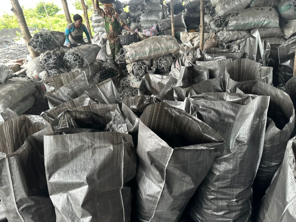 Sacks being filled at the packing yard